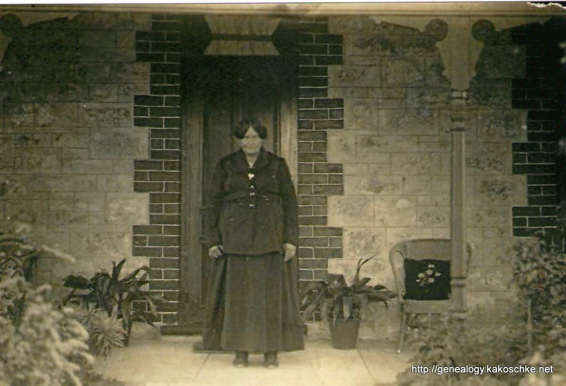 Emilie Auguste KAKOSCHKE nee WITTWER outside her home in Morgan